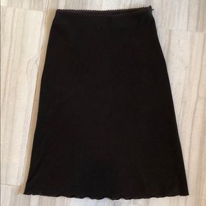 Brown skirt with scalloped hem